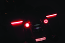 Kuryakyn Tracer LED Rear Turn Signal Inserts with Red/Red Smoke Lens for Harley Davidson FLHX and FLTRX Models