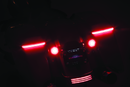 Kuryakyn Tracer LED Rear Turn Signal Inserts with Red/Red Smoke Lens for Harley Davidson FLHX and FLTRX Models